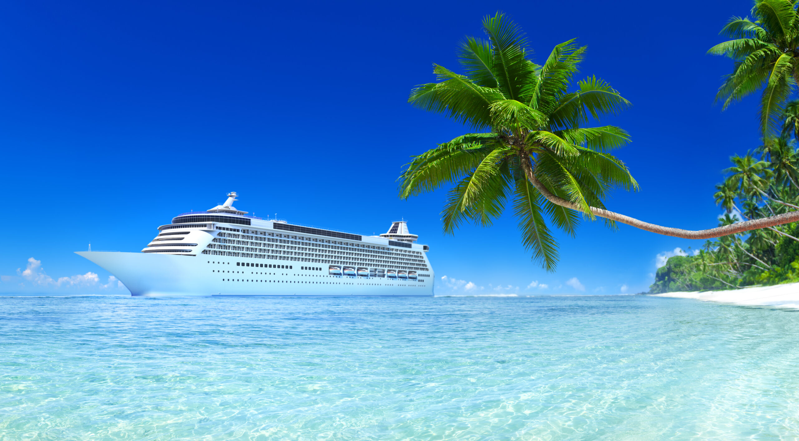 A cruise ship in turquoise Caribbean water